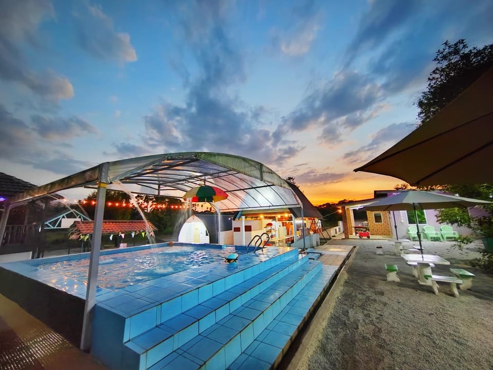 Property building, Seating area, Swimming pool, Sunset