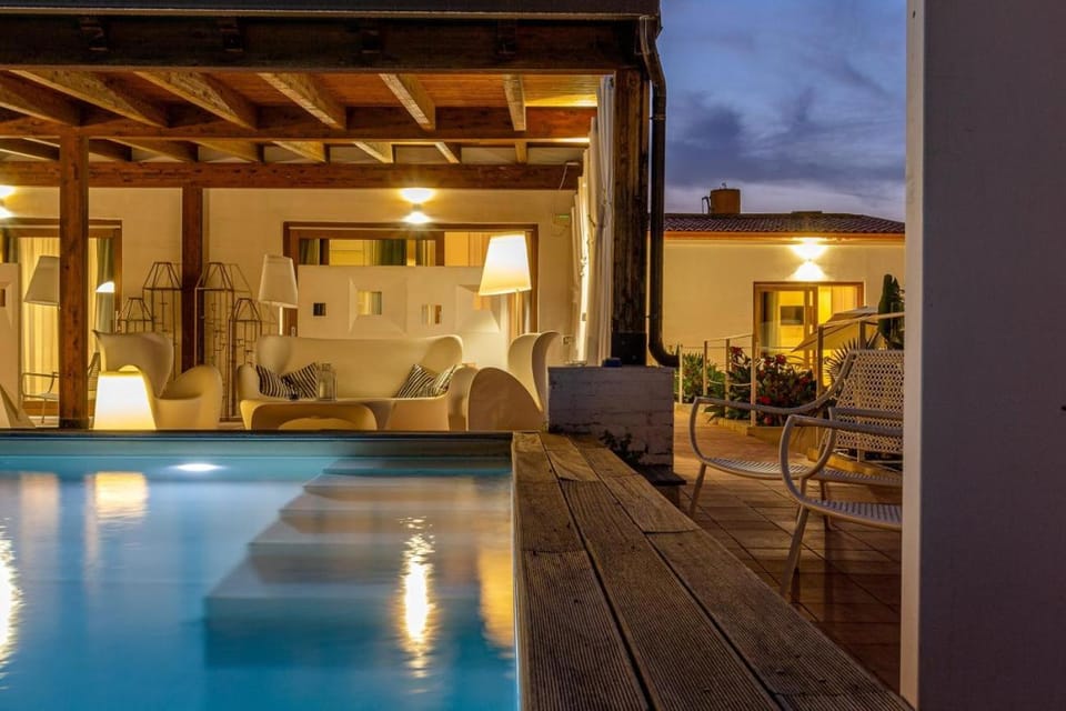 Property building, Patio, Night, Pool view, Swimming pool, Swimming pool