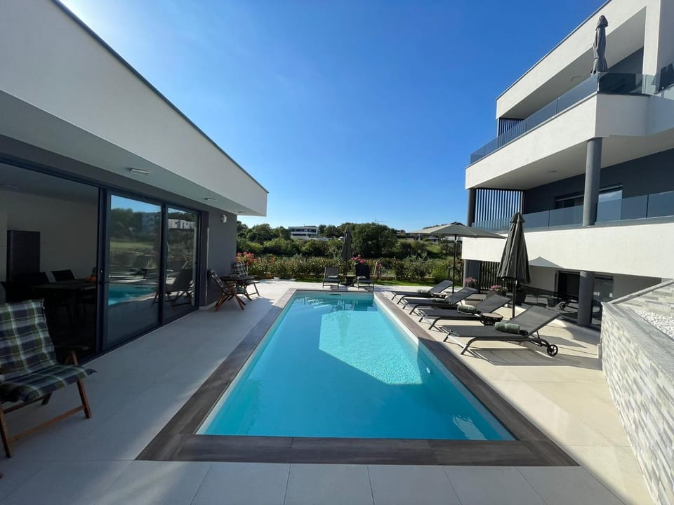 Property building, Patio, Swimming pool
