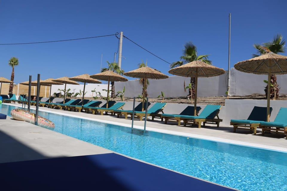 Swimming pool, sunbed