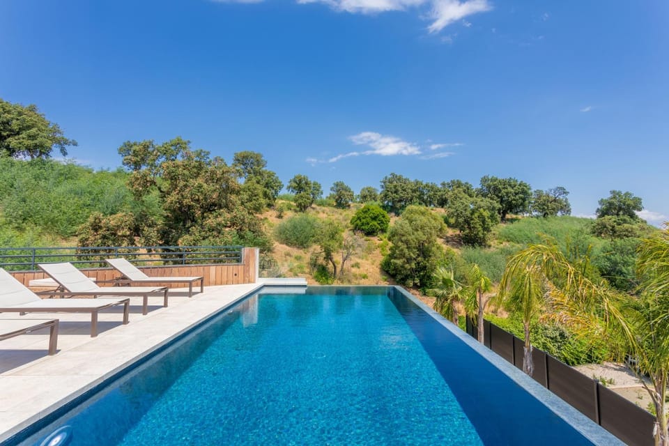 Property building, Living room, Swimming pool