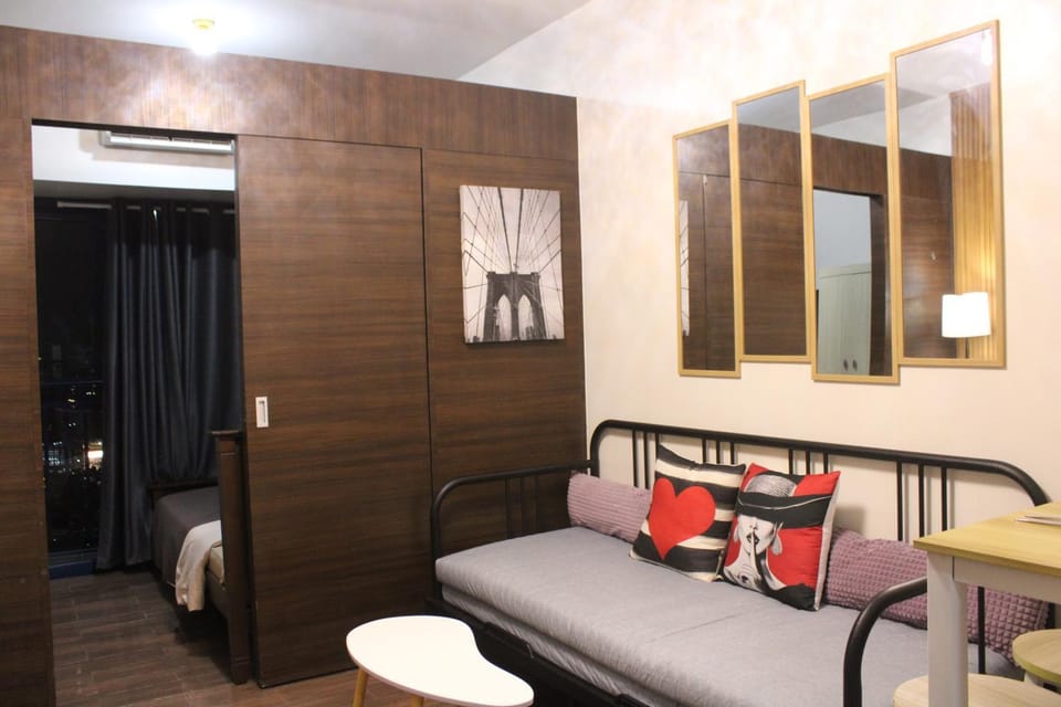 Bed, Living room, Seating area, Bedroom, air conditioner