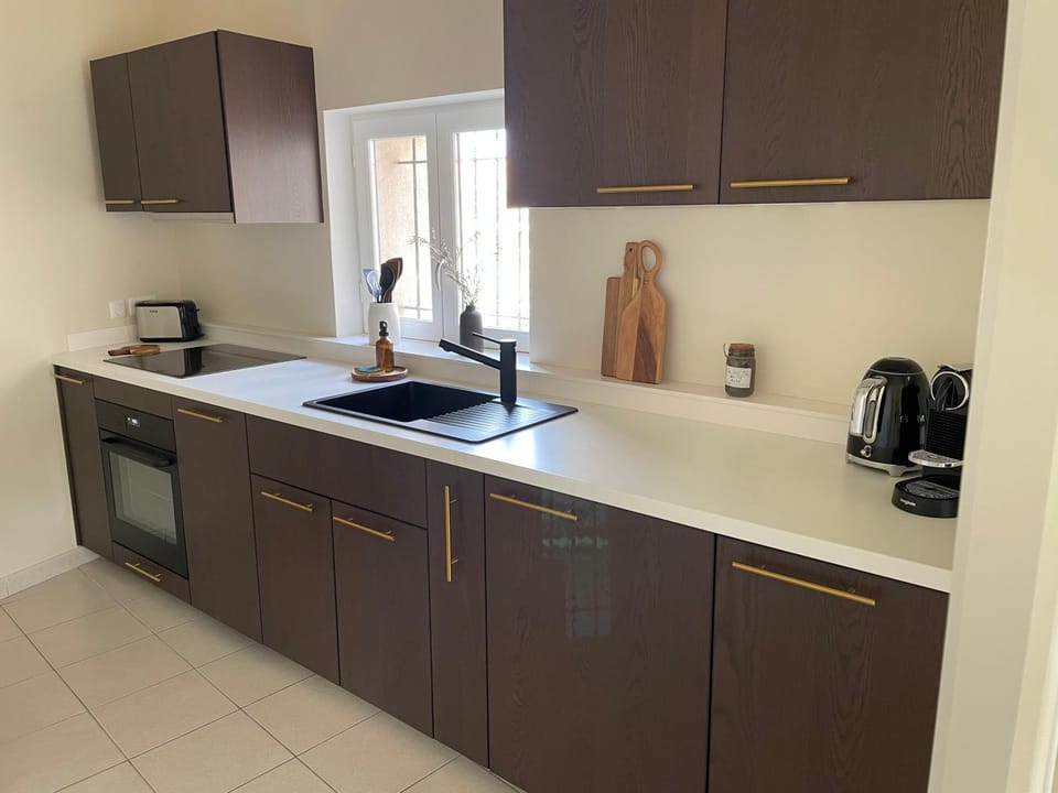 Kitchen or kitchenette, stove