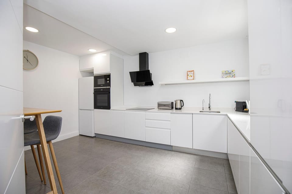 Kitchen or kitchenette, stove, toaster
