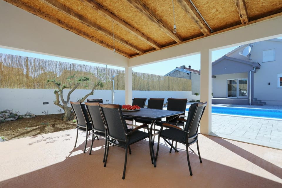 Patio, Day, Pool view, Swimming pool, sunbed