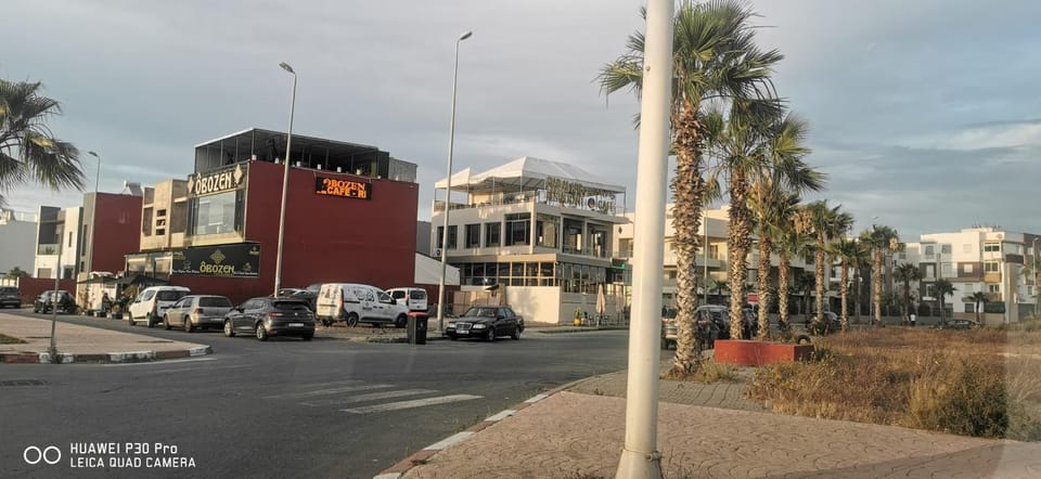 Property building, Day, Neighbourhood, City view, Street view, Location, Parking