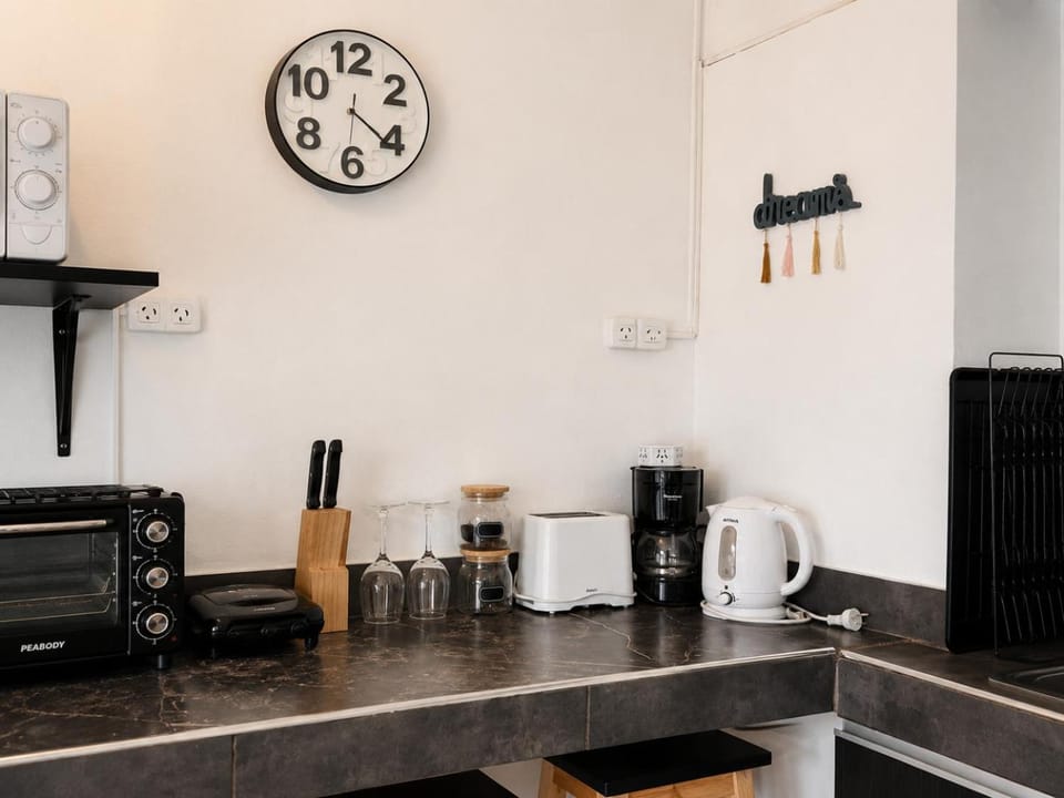 Kitchen or kitchenette, stove
