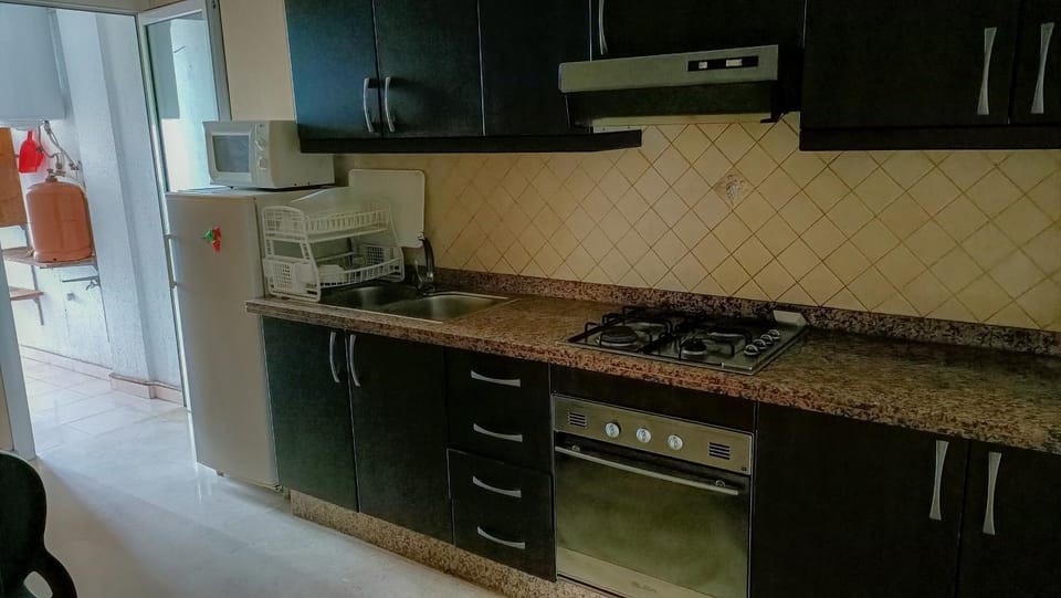 Kitchen or kitchenette, stove