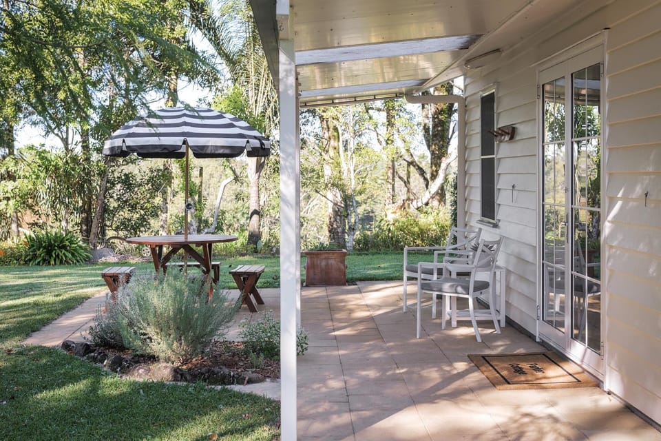 Property building, Patio, Natural landscape, View (from property/room), Seating area