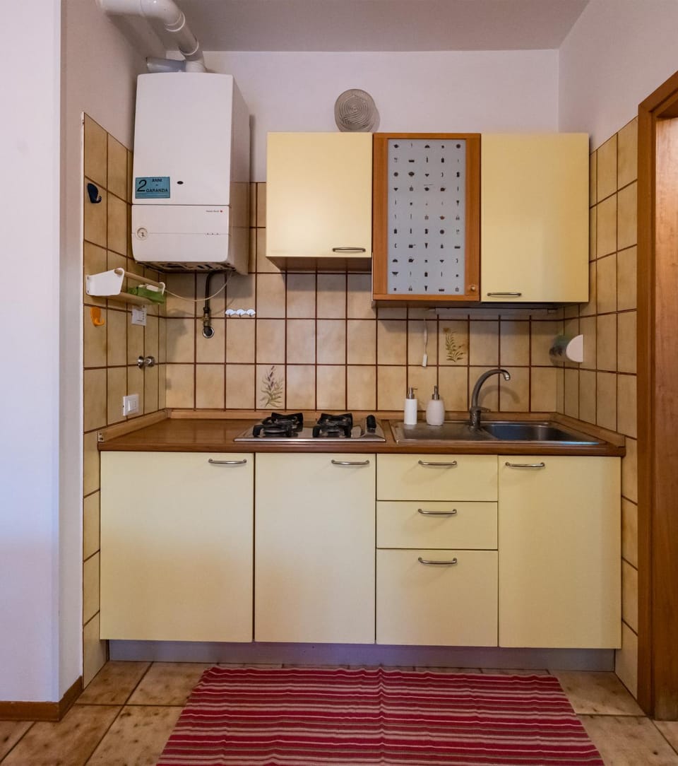 Kitchen or kitchenette, stove