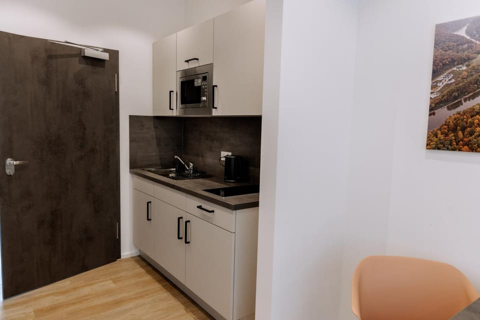 Kitchen or kitchenette, stove