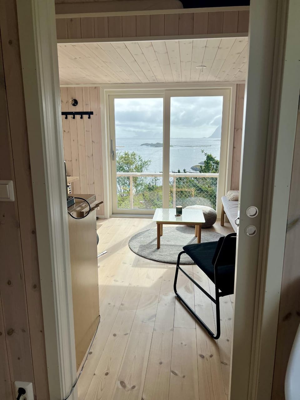 View (from property/room), Living room, Seating area, Sea view