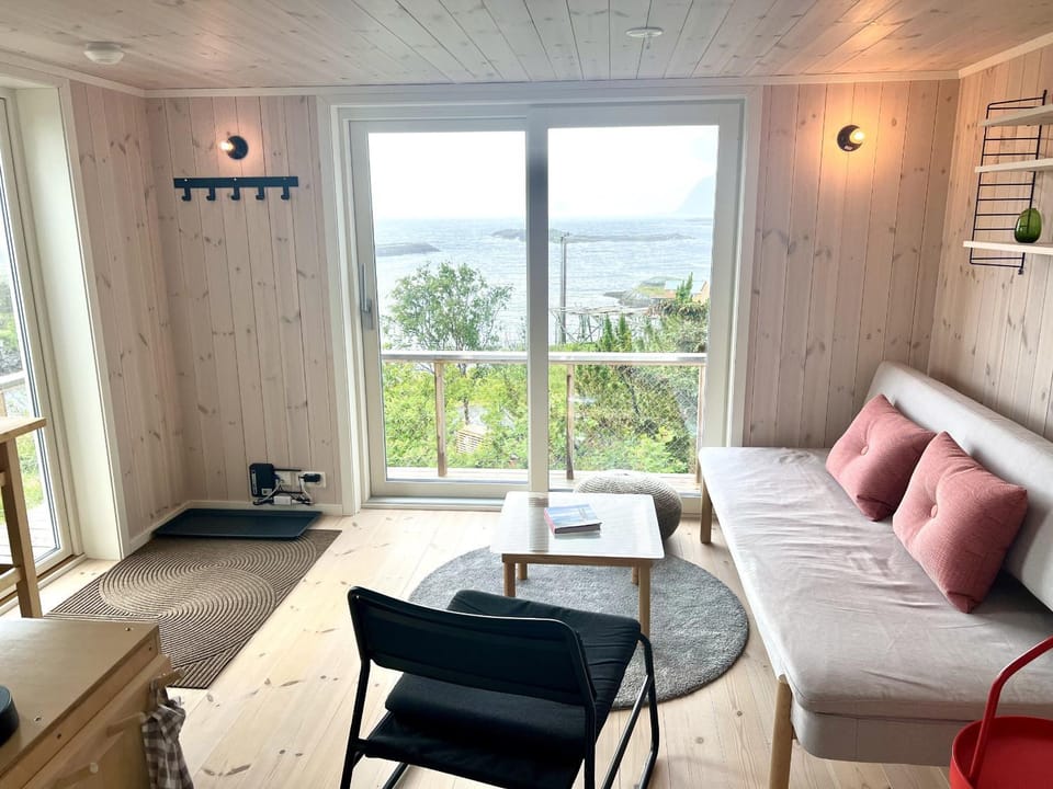 View (from property/room), Living room, Seating area, Mountain view, Sea view