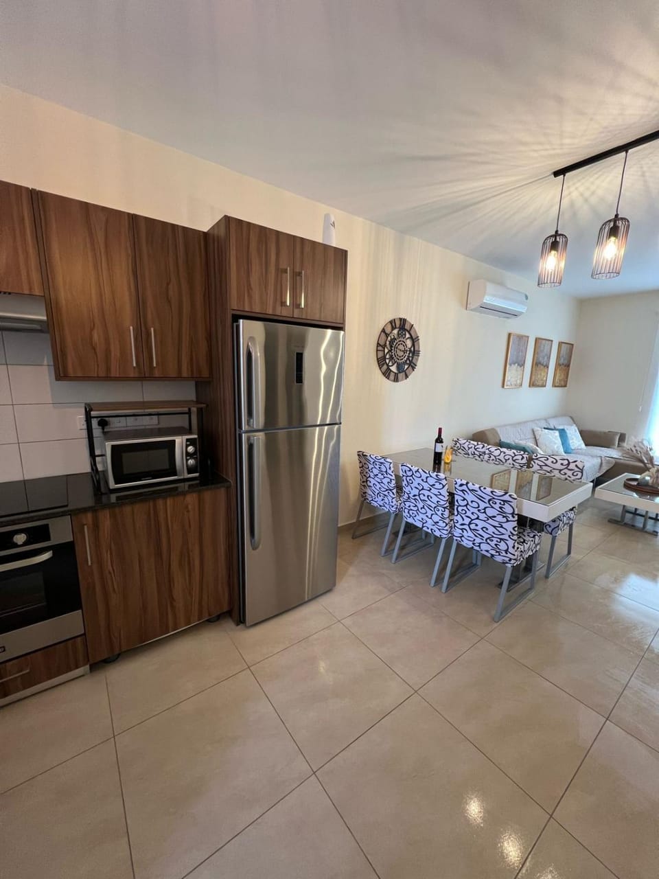 Kitchen or kitchenette, Living room, Seating area, Dining area, dishwasher, oven, stove, toaster