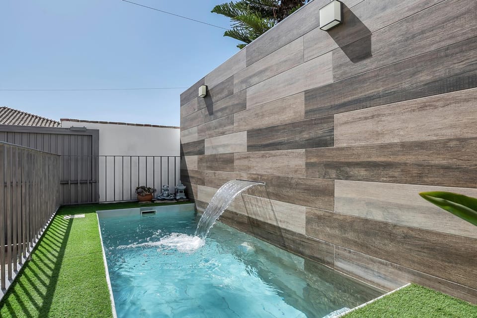 Property building, Living room, Swimming pool