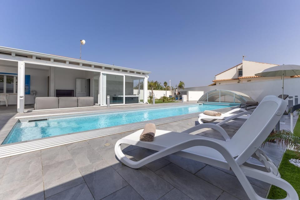 Property building, Living room, Swimming pool
