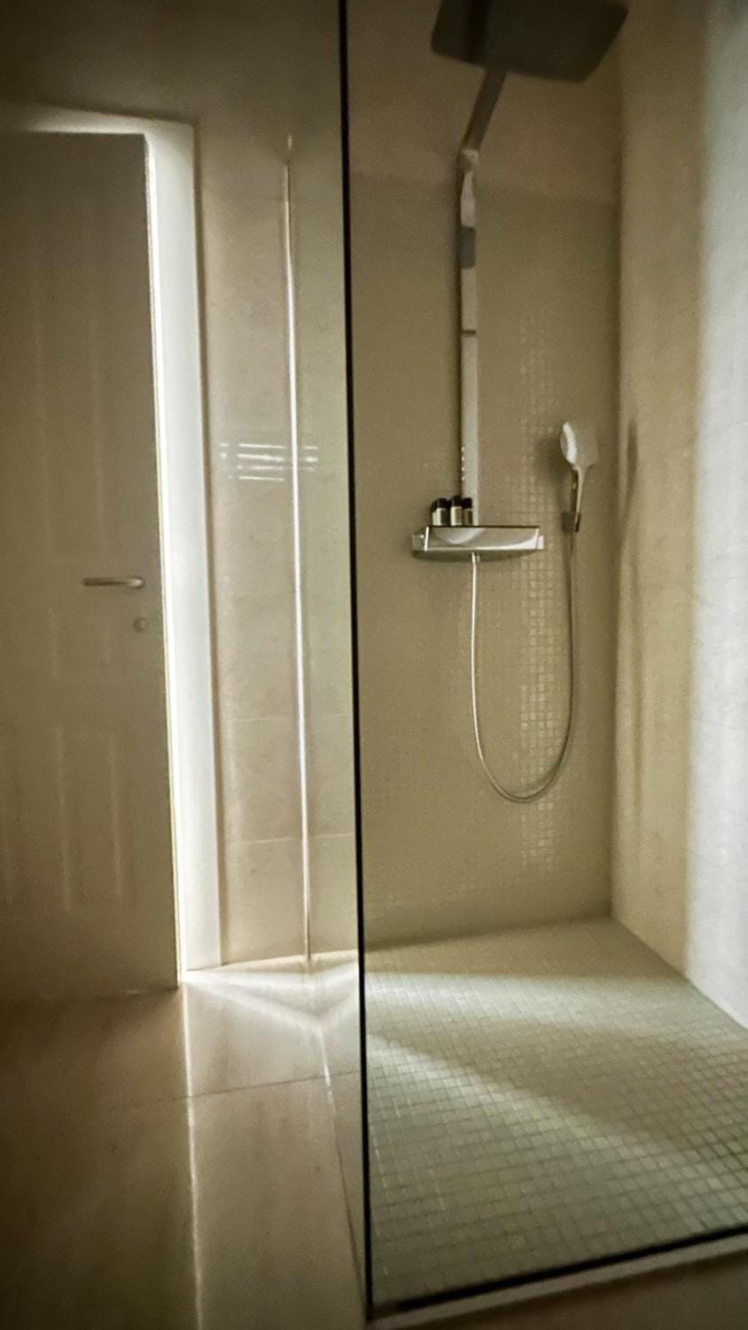 Shower, Bathroom, hair dryier, towels