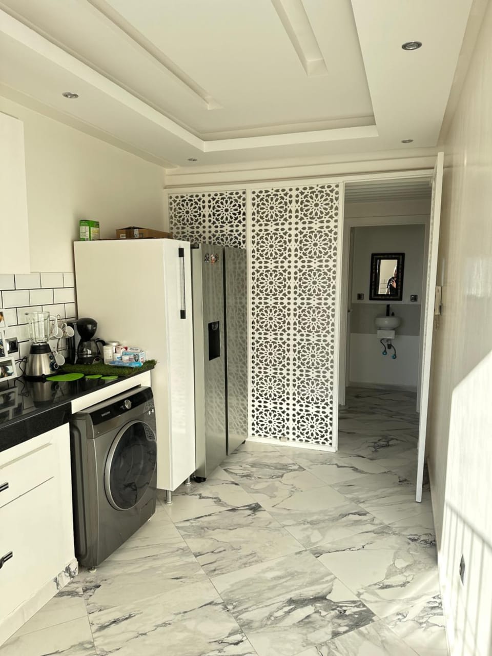 Kitchen or kitchenette, dishwasher, oven, washing machine, dryer
