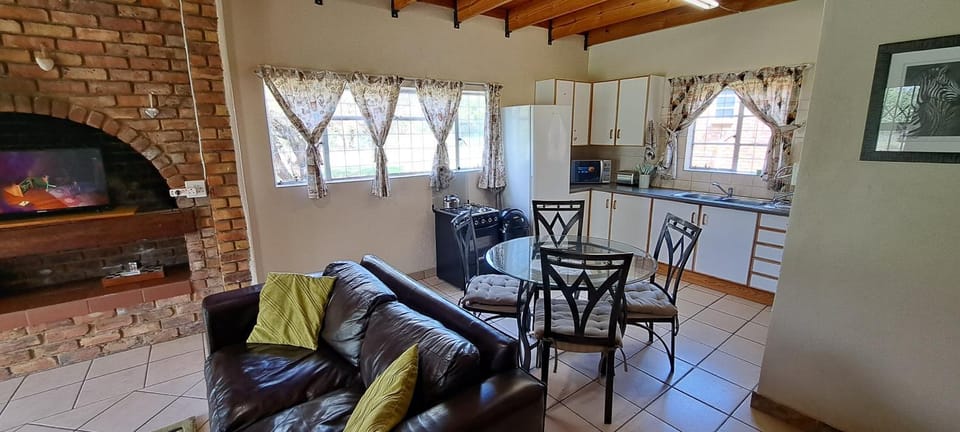 Kitchen or kitchenette, Living room, Seating area, Dining area, pet friendly
