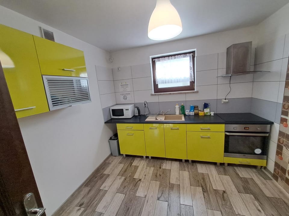 Kitchen or kitchenette, oven, stove