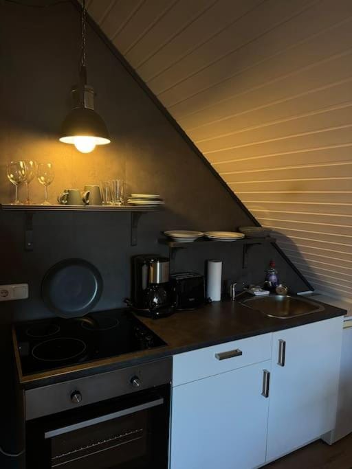 Kitchen or kitchenette, stove