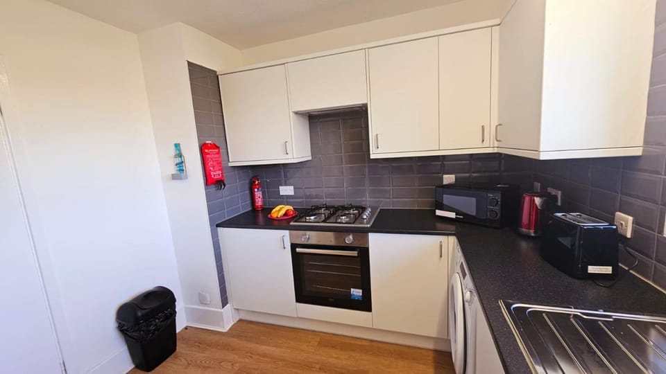 Coffee/tea facilities, microwave, toaster, washing machine, washing machine, kitchen