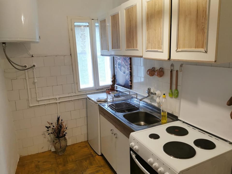 Kitchen or kitchenette, stove