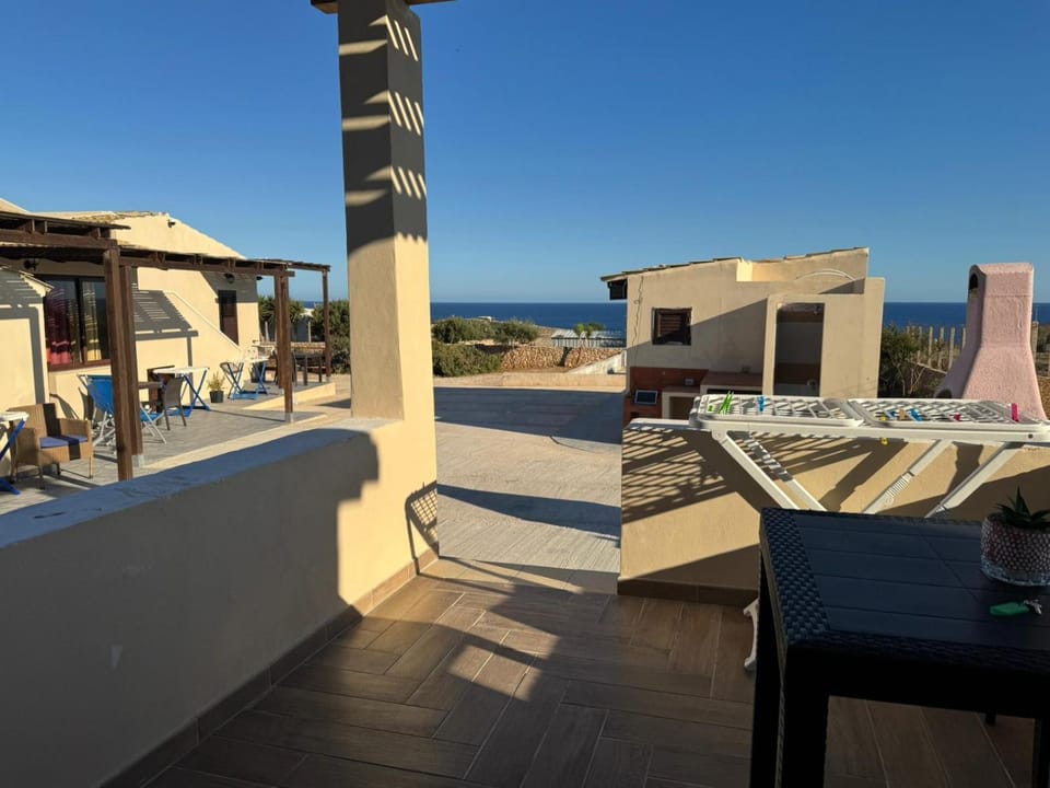 Property building, Patio, Day, Natural landscape, View (from property/room), Balcony/Terrace, Dining area, Sea view