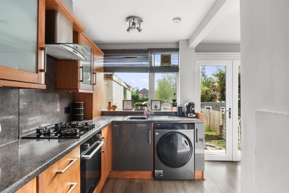 Kitchen or kitchenette, oven, stove, washing machine, kitchen