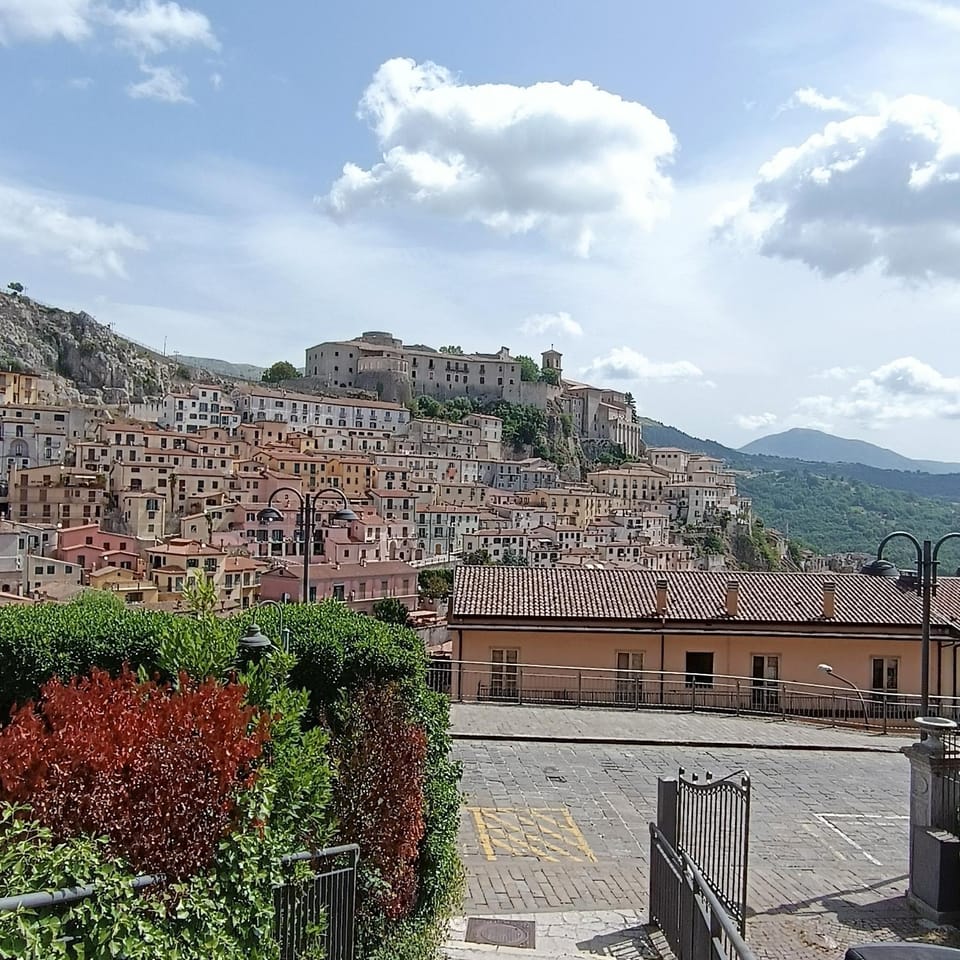 Property building, Nearby landmark, Day, Natural landscape, City view, Mountain view