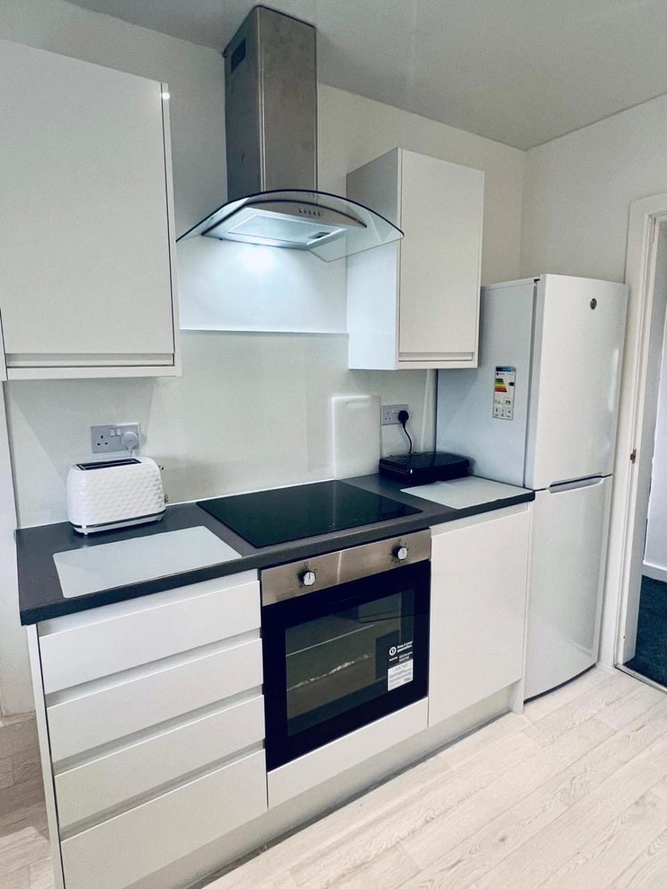 Kitchen or kitchenette, oven