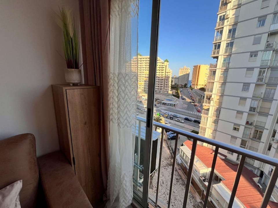 Property building, Day, View (from property/room), Living room, City view