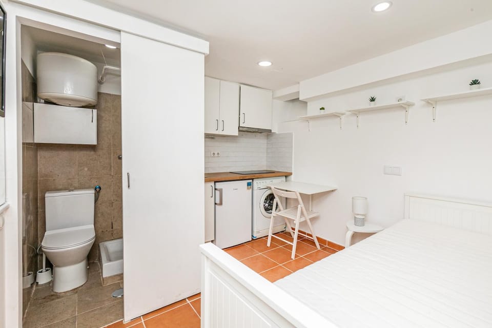 Shower, Toilet, Bed, Bathroom, Kitchen or kitchenette