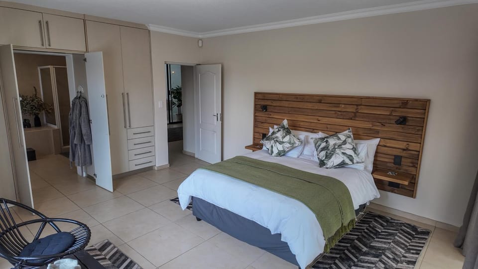 Shower, Toilet, Bed, Bathroom, Seating area, Bedroom, Bath, internet, towels, wardrobe