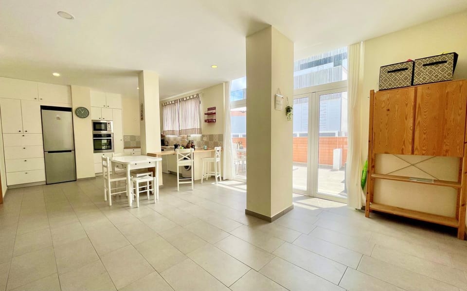 Kitchen or kitchenette, dishwasher, oven, stove