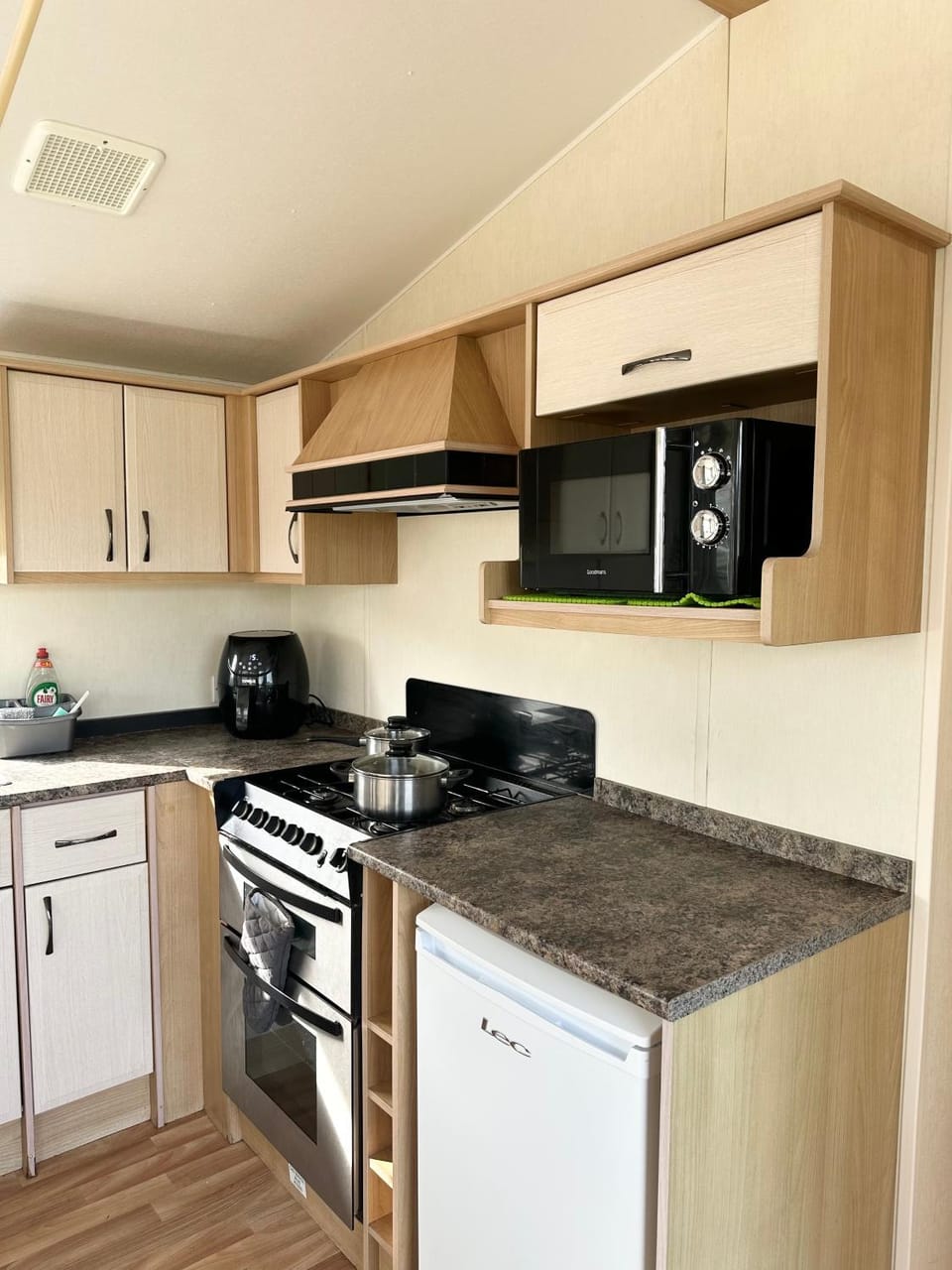 Kitchen or kitchenette, oven