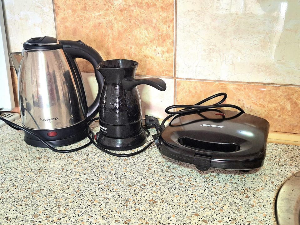 Kitchen or kitchenette, toaster