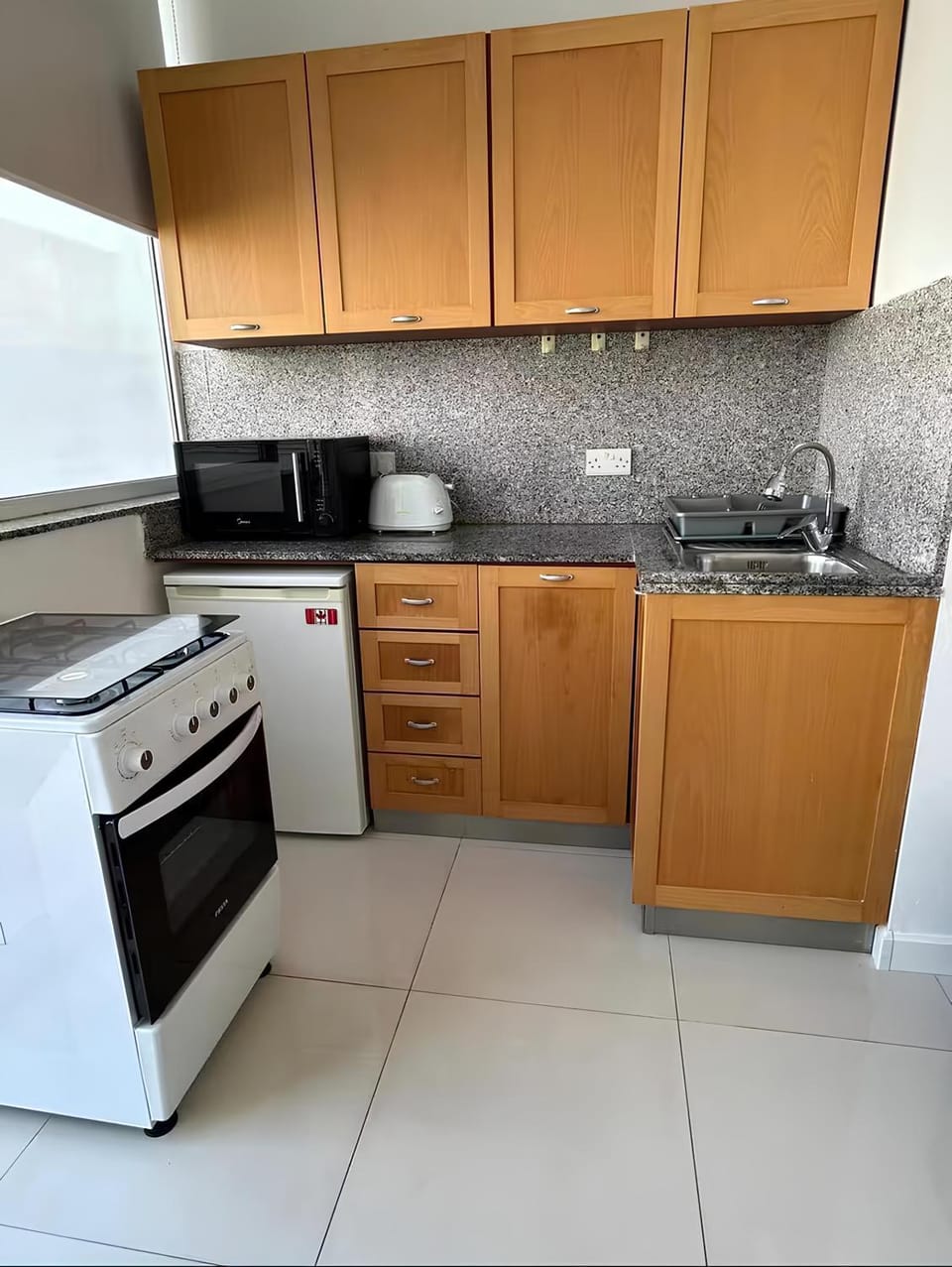 Kitchen or kitchenette, oven, stove