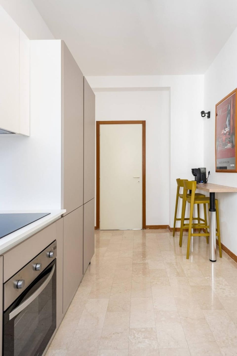 Kitchen or kitchenette, dishwasher, oven, stove