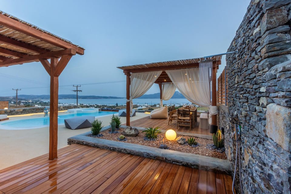 Property building, Patio, Day, Natural landscape, View (from property/room), Balcony/Terrace, Pool view, Sea view, Swimming pool, sunbed