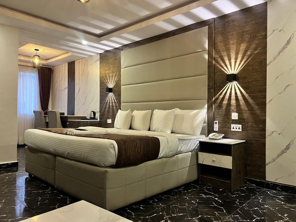 Bed, Seating area, Bedroom, towels, air conditioner