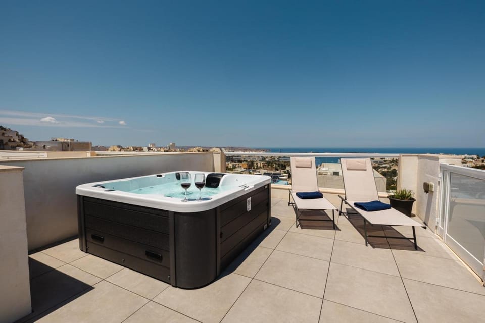 Mellieha Penthouse seaviews hot tub by Homely Apartment in Malta