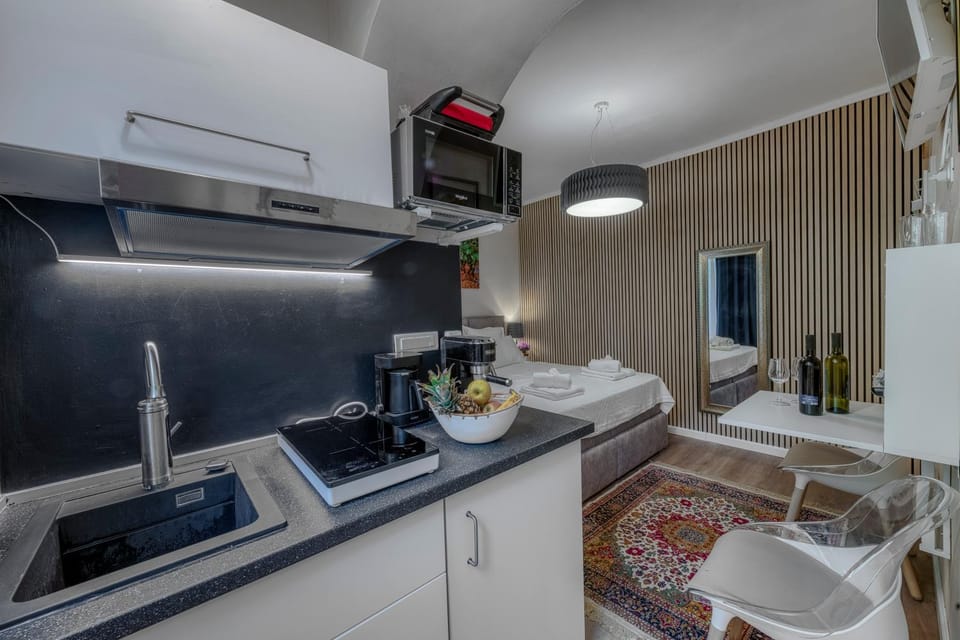Bedroom, microwave, stove, kitchen