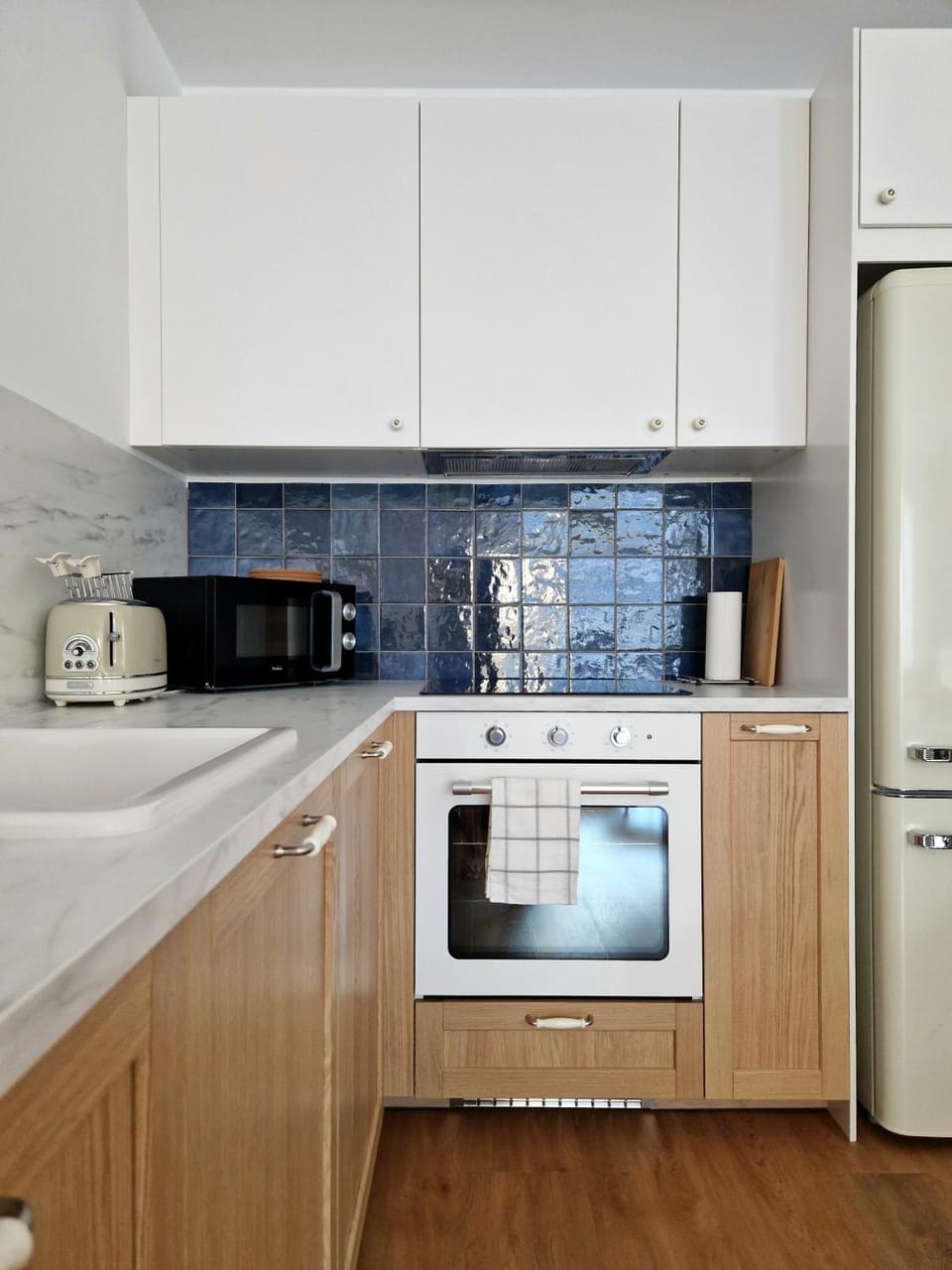 Kitchen or kitchenette, microwave, oven, stove, toaster