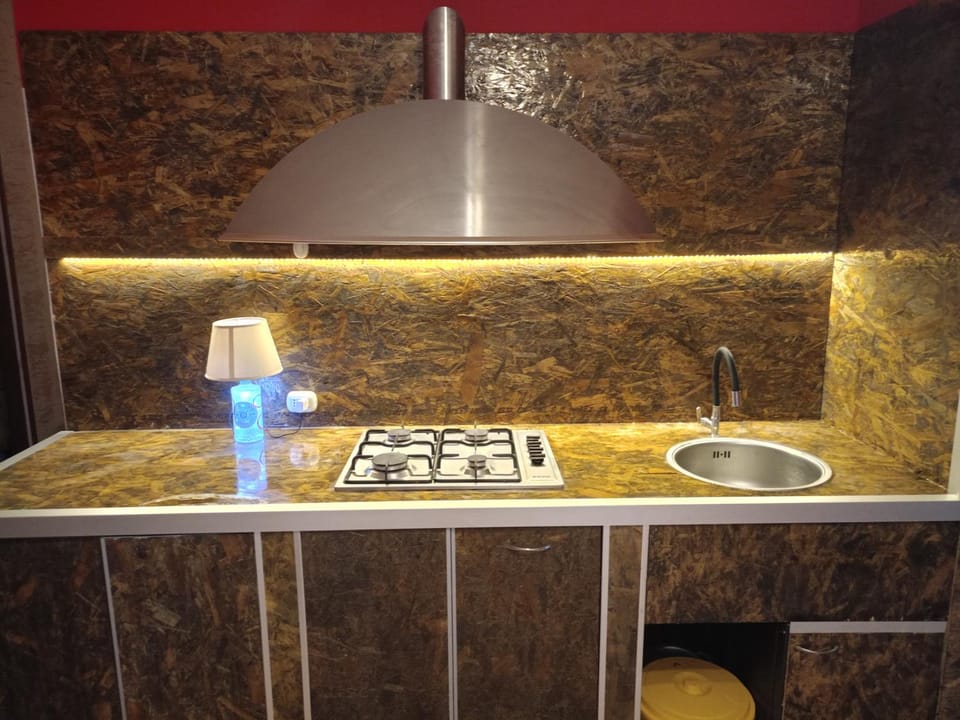 Kitchen or kitchenette, stove