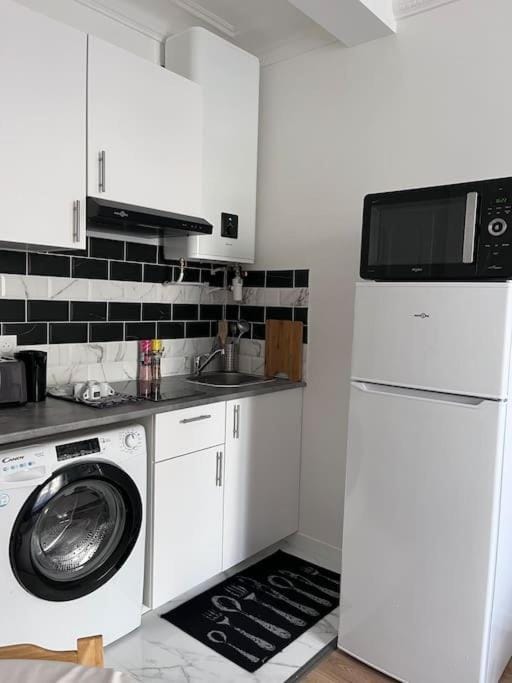 Kitchen or kitchenette, oven, stove, toaster