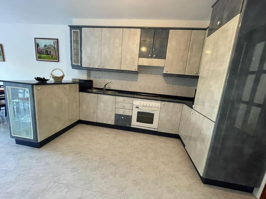 Kitchen or kitchenette, oven, stove