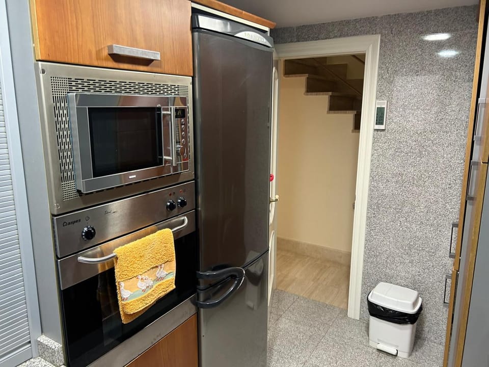 Kitchen or kitchenette, microwave, oven