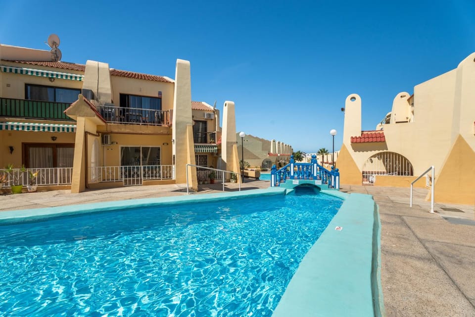 Property building, Living room, Swimming pool