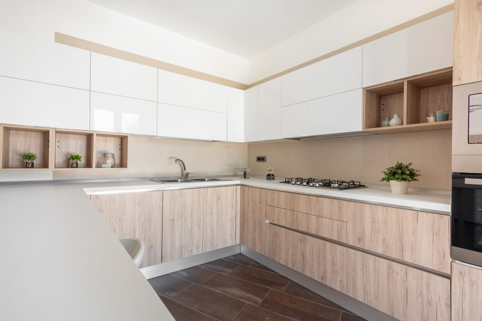 Kitchen or kitchenette, dishwasher, stove